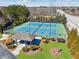 Community tennis courts with gazebo offer a shaded seating area and well-maintained green courts at 2952 Perimeter Cir, Buford, GA 30519