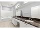 Large bathroom offers marble countertops, double sinks, and a soaking tub at 10 Perimeter Summit Ne Blvd # 4312, Atlanta, GA 30319