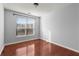 Bedroom with hardwood floors and natural light creates a serene atmosphere at 10 Perimeter Summit Ne Blvd # 4312, Atlanta, GA 30319