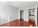 Bedroom with hardwood floors, offering easy access to the closet and bathroom at 10 Perimeter Summit Ne Blvd # 4312, Atlanta, GA 30319