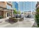 Exterior view of building with a fountain, outdoor seating, and landscaping at 10 Perimeter Summit Ne Blvd # 4312, Atlanta, GA 30319