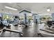 Well-equipped gym with treadmills, weight machines, and large windows for natural light at 10 Perimeter Summit Ne Blvd # 4312, Atlanta, GA 30319