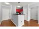 A kitchen with stainless steel appliances and a breakfast bar with seating at 10 Perimeter Summit Ne Blvd # 4312, Atlanta, GA 30319