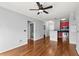 A spacious living room area featuring hardwood floors and an open floor plan to kitchen at 10 Perimeter Summit Ne Blvd # 4312, Atlanta, GA 30319
