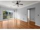 A living room showing natural light with hardwood floors and a balcony at 10 Perimeter Summit Ne Blvd # 4312, Atlanta, GA 30319