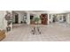 Spacious lobby area with tiled flooring and potted plants at 10 Perimeter Summit Ne Blvd # 4312, Atlanta, GA 30319