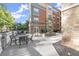 Building exterior with outdoor seating, a fountain, and manicured landscaping at 10 Perimeter Summit Ne Blvd # 4312, Atlanta, GA 30319