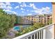 A beautiful view of the community pool and landscaping from a private balcony at 10 Perimeter Summit Ne Blvd # 4312, Atlanta, GA 30319