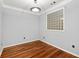 Well lit room with hardwood floors, glass block window, and white trim details add charm at 10 Perimeter Summit Ne Blvd # 4312, Atlanta, GA 30319