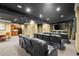 Comfortable theater room with rows of leather seating, kitchenette, and large screen TV at 10 Perimeter Summit Ne Blvd # 4312, Atlanta, GA 30319
