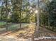 The expansive backyard features mature trees, offering a tranquil and private outdoor space at 198 Johnson Ferry Nw Rd, Atlanta, GA 30328