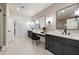 Bathroom with double vanities, a makeup station, and a glass-enclosed shower at 198 Johnson Ferry Nw Rd, Atlanta, GA 30328