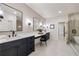 Bathroom with double vanities, a makeup station, and a glass-enclosed shower at 198 Johnson Ferry Nw Rd, Atlanta, GA 30328
