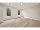 Well-lit bedroom featuring two large windows and modern interior at 198 Johnson Ferry Nw Rd, Atlanta, GA 30328