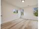 Bright bedroom with modern window and hardwood floors at 198 Johnson Ferry Nw Rd, Atlanta, GA 30328