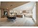 Open-concept kitchen and dining area with a large island and wood-slat ceiling at 198 Johnson Ferry Nw Rd, Atlanta, GA 30328