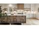 Bright, modern kitchen featuring an island, open shelves, and updated appliances at 198 Johnson Ferry Nw Rd, Atlanta, GA 30328