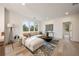 Bright and airy living room featuring a large window and stylish contemporary furnishings at 198 Johnson Ferry Nw Rd, Atlanta, GA 30328