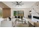 Spacious living room featuring a marble fireplace and a sliding glass door leading to a deck at 198 Johnson Ferry Nw Rd, Atlanta, GA 30328