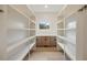 Walk-in pantry with custom shelves, drawers, and counter space at 198 Johnson Ferry Nw Rd, Atlanta, GA 30328