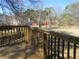 Wooden back deck overlooking the yard, offering a tranquil space for outdoor enjoyment at 2870 Whiteview Nw Dr, Acworth, GA 30101