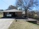 A carport with a cement foundation and a truck parked inside at 2870 Whiteview Nw Dr, Acworth, GA 30101