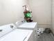 Functional laundry room equipped with a washer and dryer for convenient home chores at 2870 Whiteview Nw Dr, Acworth, GA 30101