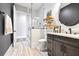 Beautiful bathroom features a glass-enclosed shower, and modern vanity at 8710 Little Mill Rd, Cumming, GA 30041