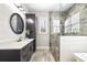 Beautiful bathroom showcasing a glass shower, vanity with sink, and stylish decor at 8710 Little Mill Rd, Cumming, GA 30041