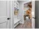 Charming entryway boasts a built-in bench and storage, providing functionality at 8710 Little Mill Rd, Cumming, GA 30041