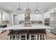Well-lit kitchen featuring pendant lighting, modern appliances and ample counter space at 8710 Little Mill Rd, Cumming, GA 30041