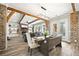 Cozy open living and dining area with brick accents and a walk-out patio at 8710 Little Mill Rd, Cumming, GA 30041