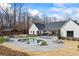 Breathtaking backyard featuring a gunite pool, stone accents, and a lovely gazebo for outdoor relaxation at 8710 Little Mill Rd, Cumming, GA 30041