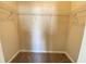 Walk-in closet with carpet and metal shelving for organization at 2677 Pearl Ridge Trce, Buford, GA 30519
