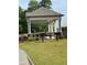 Community gazebo with picnic tables and grills in a well-maintained grassy area at 2677 Pearl Ridge Trce, Buford, GA 30519