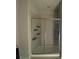 Glass shower with a tile surround and shelving for bath products at 2677 Pearl Ridge Trce, Buford, GA 30519