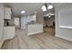 Eat-in kitchen featuring hardwood floors and an eat in bar area at 8541 Glendevon Ct, Riverdale, GA 30274