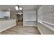 Eat-in kitchen with hardwood floors and stainless steel appliances at 8541 Glendevon Ct, Riverdale, GA 30274