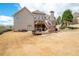 Expansive backyard featuring a two-level wooden deck, perfect for outdoor entertaining at 1227 Castle Point Sw Ct, Conyers, GA 30094