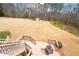 This home features a vast backyard perfect for relaxation and entertainment at 1227 Castle Point Sw Ct, Conyers, GA 30094