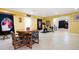 Basement area featuring a dining table, exercise equipment, and an open layout at 1227 Castle Point Sw Ct, Conyers, GA 30094