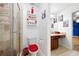 Bright bathroom featuring a glass shower, toilet with a red seat, and granite vanity countertop at 1227 Castle Point Sw Ct, Conyers, GA 30094
