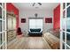 Comfortable bedroom with hardwood floors, ample natural light, and neutral decor at 1227 Castle Point Sw Ct, Conyers, GA 30094