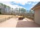 Wooden deck featuring outdoor furniture and a view of the spacious backyard at 1227 Castle Point Sw Ct, Conyers, GA 30094