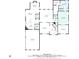 Detailed floor plan layout of the main level showcasing the kitchen, dining, living room, and garage at 1227 Castle Point Sw Ct, Conyers, GA 30094