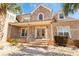 Inviting front porch with decorative glass doors and brick steps, perfect for relaxing outdoors at 1227 Castle Point Sw Ct, Conyers, GA 30094