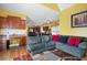 View of the living room, and open kitchen area at 1227 Castle Point Sw Ct, Conyers, GA 30094