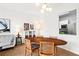 Open-concept dining room with a view into the kitchen at 130 26Th Nw St # 511, Atlanta, GA 30309