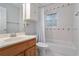 Clean bathroom with white tile, vanity, and shower/tub combination at 2232 Dunseath Nw Ave # 302, Atlanta, GA 30318