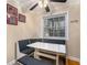 Cozy breakfast nook with built-in seating and a white table at 2232 Dunseath Nw Ave # 302, Atlanta, GA 30318